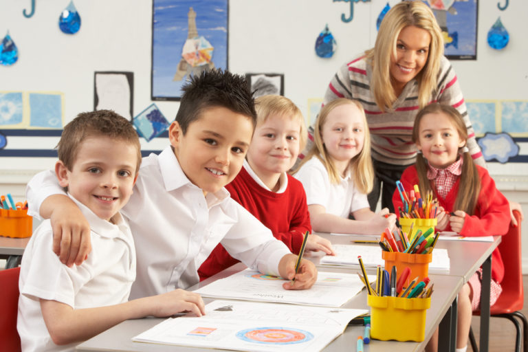 Teaching assistant working in group