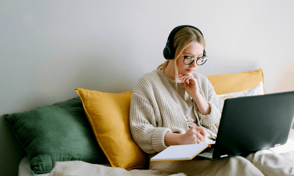 white girl searching for the best real estate agent in the UK online 