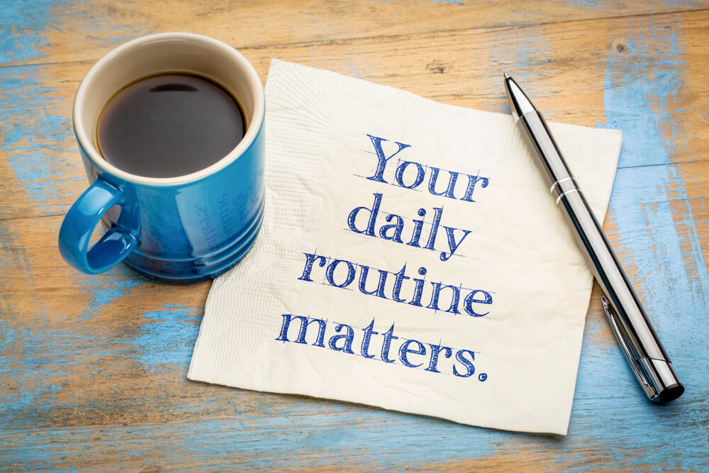 Daily routine matters-written on a napkin with a coffee cup
