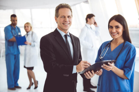 A healthcare entrepreneur working with a doctor